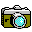 The icon shows an old-school camera body. The camera body is two tone with a grey at the top and light green at the bottom. The lens is in the center and is blue.